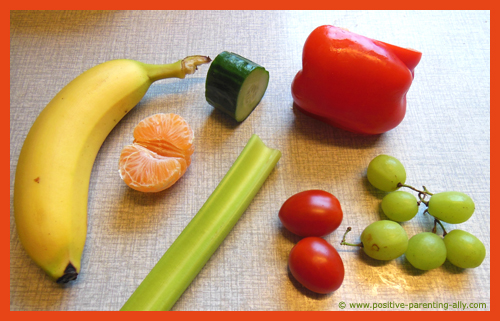 Ingredients for making raw fruit and vegetable kebabs for kids.